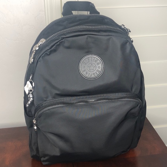 kipling citrine backpack
